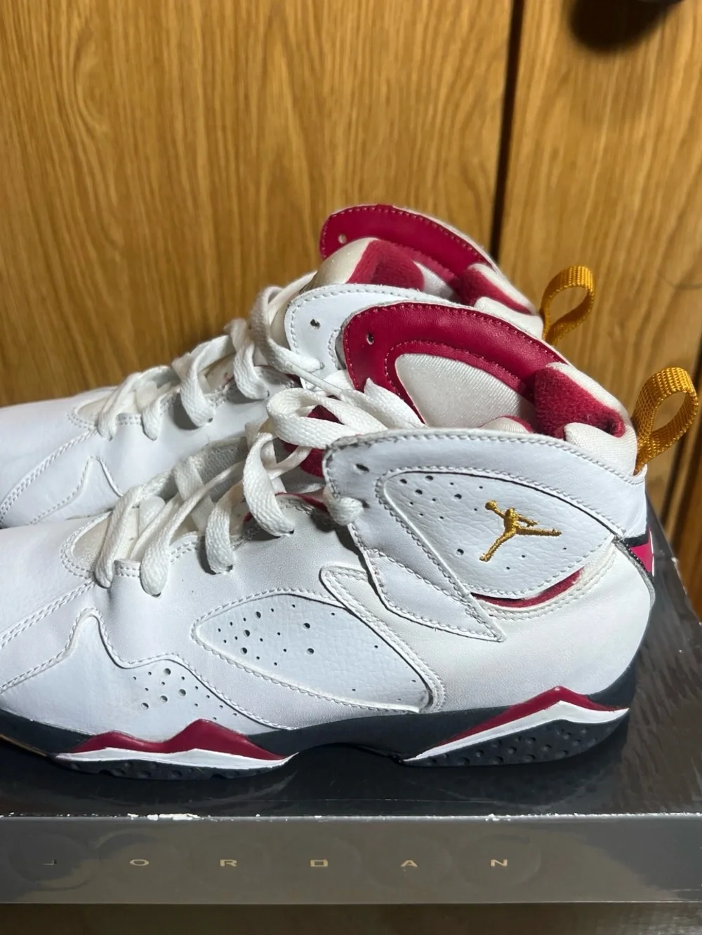 Jordan Kids White High-Top Sneakers with Pink Lining and Yellow Heel Tabs